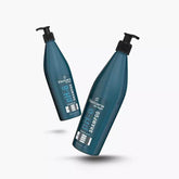 Sulfate-free shampoo bottle, dark teal, pump dispenser, angled view