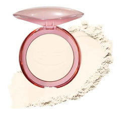 Pressed face powder compact with open lid and light beige powder pan on swatch