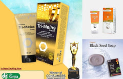 Dr. Romia skincare set with Tri-Melas cream, sunblock boxes, and black seed soap
