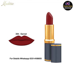 Garnet matte lipstick with gold tube and burgundy lip swatch