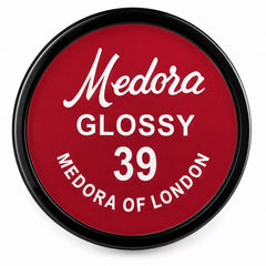 Medora Glossy 39 lipstick lid with black rim on red label
