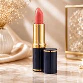 Coral pink lipstick with gold tube and navy case, open bullet tip