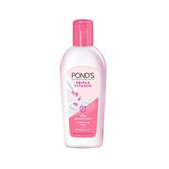 POND'S Triple Vitamin body lotion bottle with pink cap, white and pink label