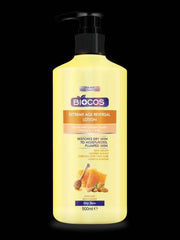Biocos Extreme Age Reversal Lotion bottle with label, pale yellow, black pump
