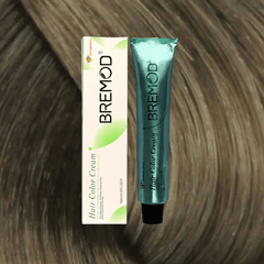 Bremod hair color cream tube and box, teal tube with black cap