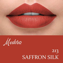 Red-orange lipstick on lips, showing smooth satin finish