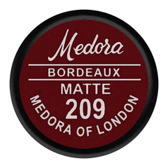 Medora Bordeaux matte 209 lipstick cap