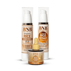 BNB radiant rice skincare trio with sunscreen, serum, and cream in three bottles and jar