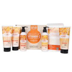 BNB Vitamin C facial kit set of tubes and bottles with bright orange labels