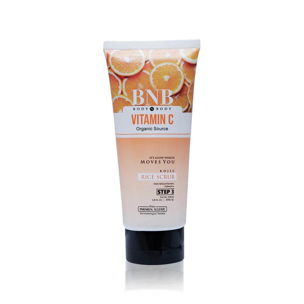 BNB Vitamin C rice scrub tube, white and orange label, black cap, 200 ml