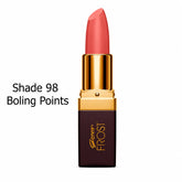 Coral red lipstick in gold cap and dark maroon base, bullet tip visible