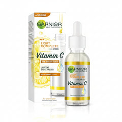 Garnier Vitamin C booster serum with dropper bottle and product box, 30 ml