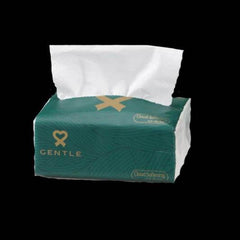 Green wettable facial tissue box with tissue sheets peeking out