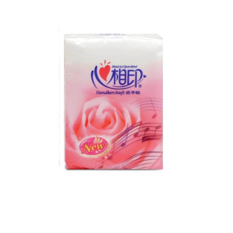 Pocket tissue pack, white and pink with rose and music note graphics