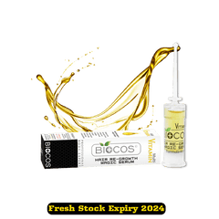 Hair regrowth serum bottle with box and gold oil splash, Biocos