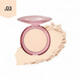 Beige face powder in round pink compact with open lid and powder