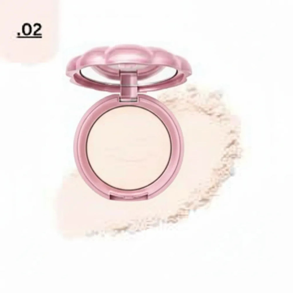 Face powder compact with open round case and pale beige pressed powder