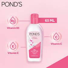 POND'S Triple Vitamin body lotion, 65 mL, pink cap and white bottle