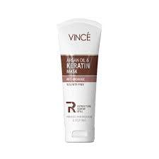 Argan oil and keratin hair mask, white squeeze tube with front label details and cap.