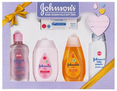 Baby essentials gift box with bottles and baby powder, purple package with ribbon