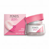Day cream jar with pink lid and product box