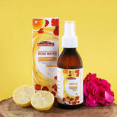 Rose water bottle with pump sprayer, amber liquid, Vitamin C label
