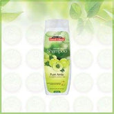 Shampoo bottle with green label reading Pure Amla and amla leaves