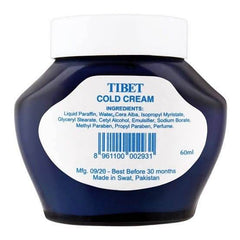 Cold cream bottle with back label listing ingredients and 60 ml, dark blue and white cap