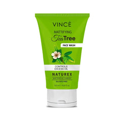 Tea tree face wash tube, green squeeze bottle with label