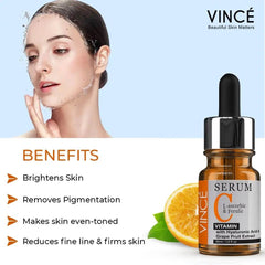 Vitamin C serum bottle with black dropper, amber glass, and gold front label