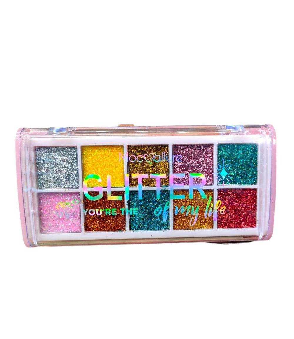 10-shade glitter makeup palette in clear case with teal, yellow, pink, red glitter squares