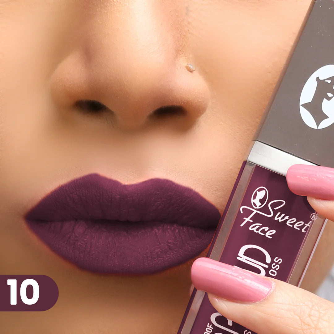 Lip gloss tube and wand applying plum lip color, shade 10