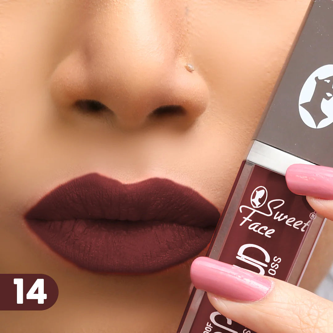 Lip gloss on lips with rose-pink applicator, rich wine burgundy finish