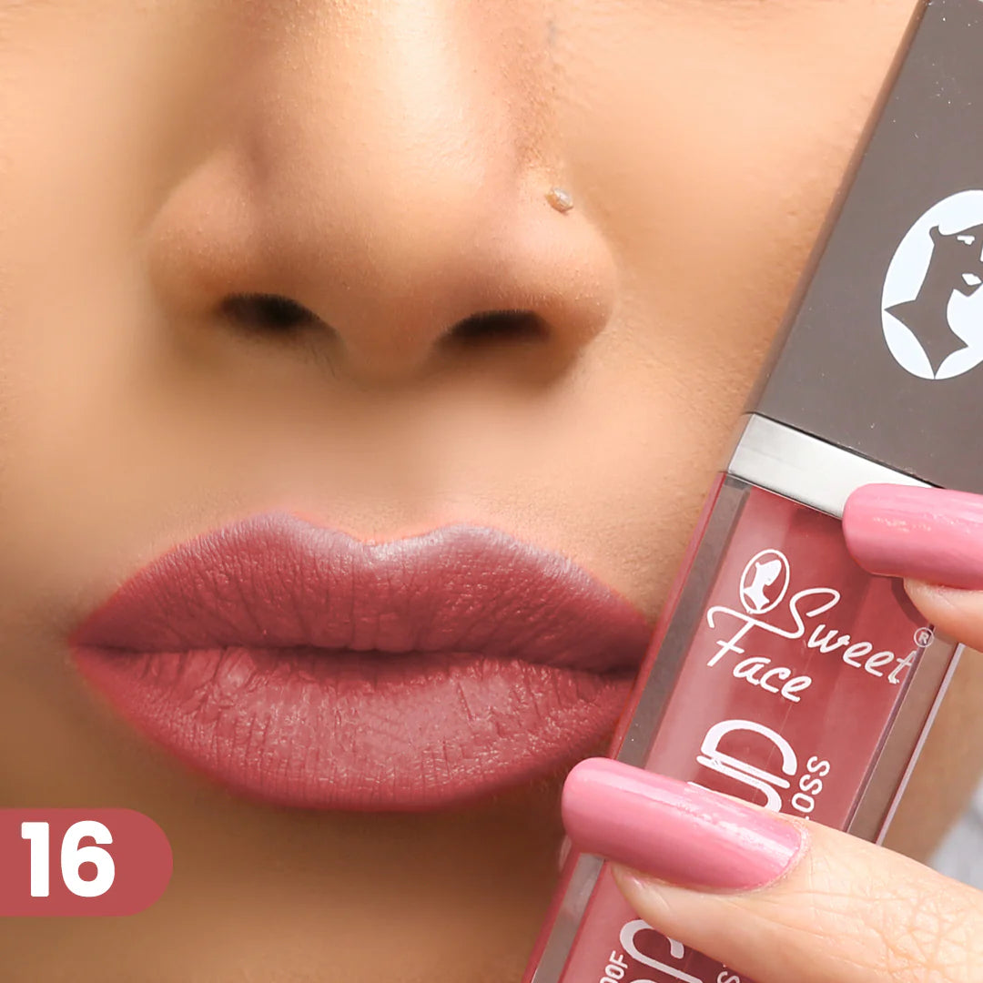 Lip gloss on lips with rose-pink applicator, dusty rose pink finish