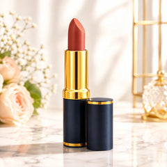 Medora 239 matte lipstick showing terracotta bullet in gold cap with navy tube