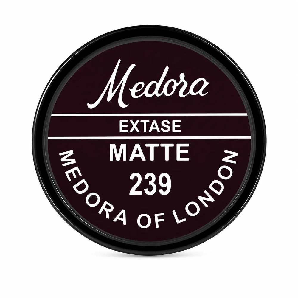 Medora Extase matte 239 tin, maroon round label with white and gold text