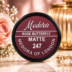 Medora matte lipstick shade 247 Rose Butterfly lid with bold branding