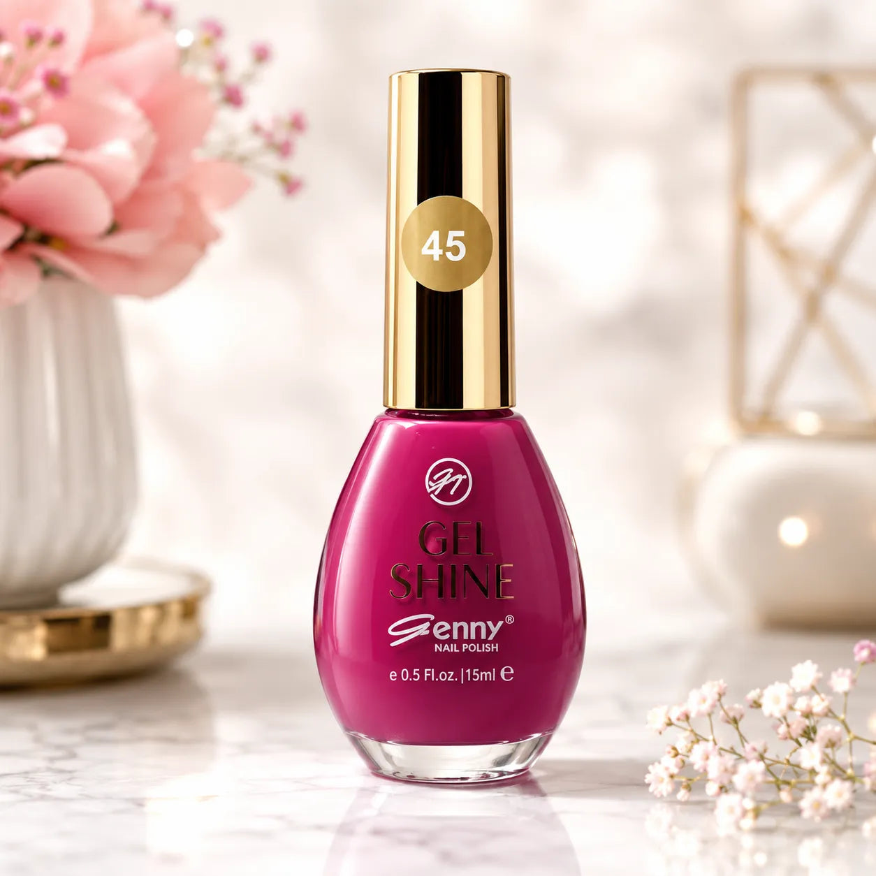 Magenta gel shine nail polish bottle with gold cap and 45 label