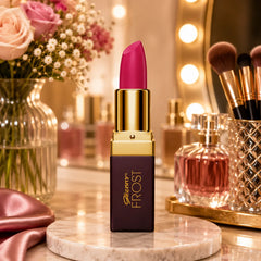 Pink-mauve lipstick tube with gold cap and Frost label