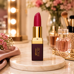 Genny Frost lipstick in red cherry shade with gold cap and base