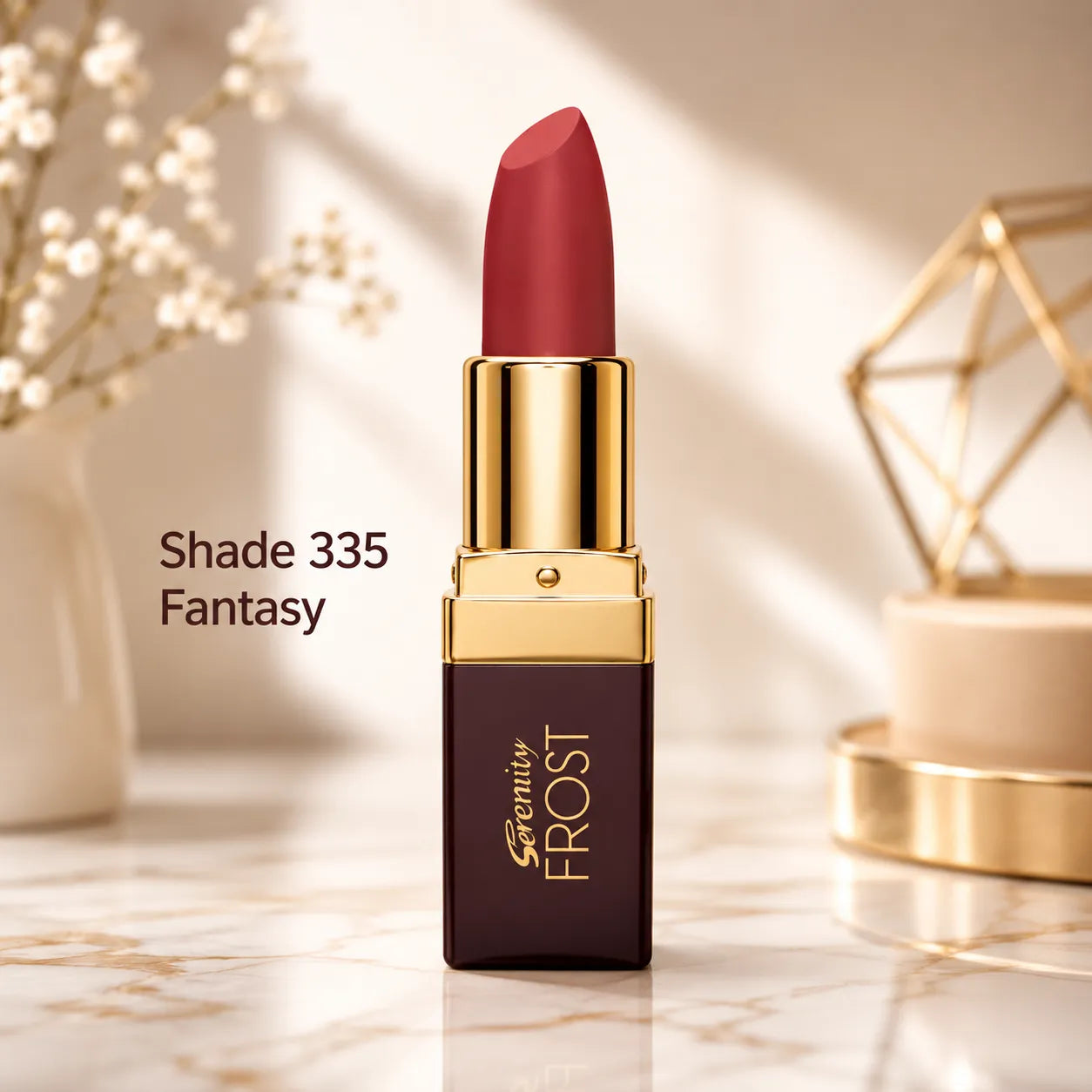 Red lipstick tube with gold cap and sleeve, centered on a glossy surface.