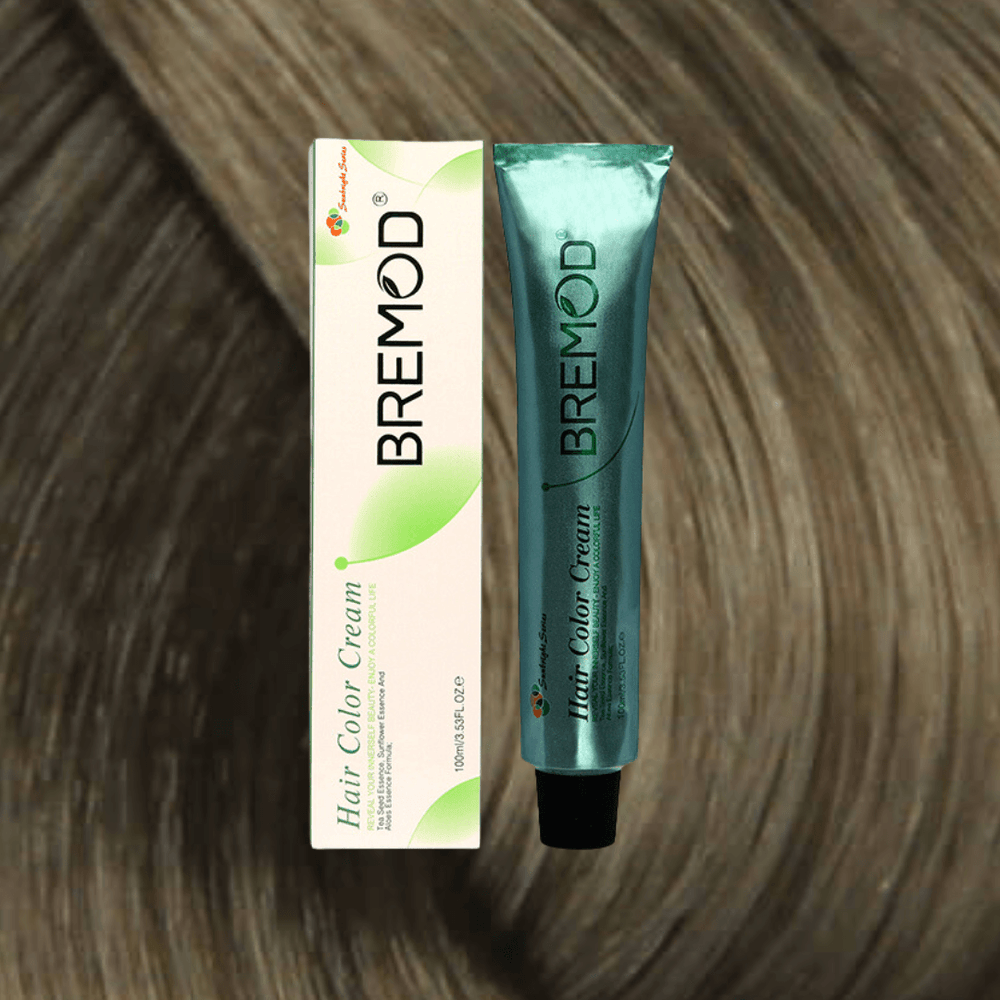 Bremod hair color cream tube and box, teal tube with black cap