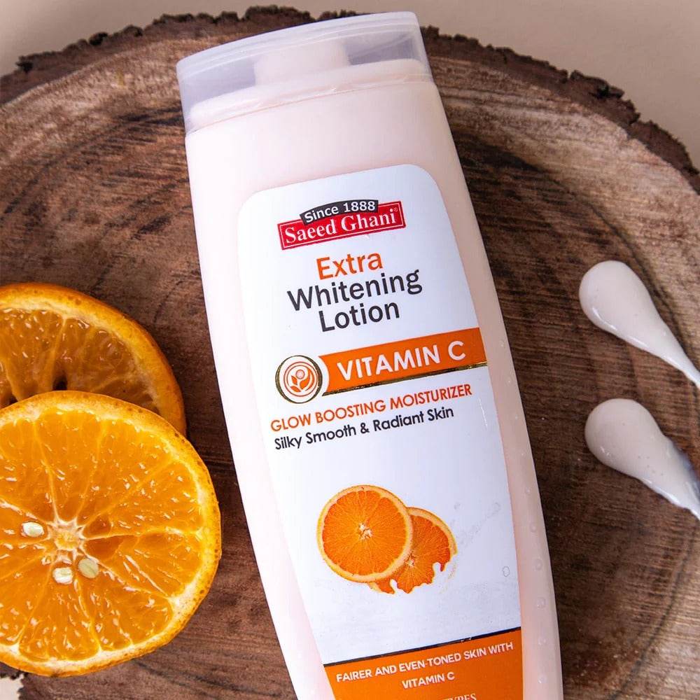 Vitamin C whitening lotion bottle with orange illustrations, white plastic, Saeed Ghani.
