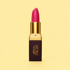 Magenta lipstick with gold cap and dark Beauty Frost label on tube
