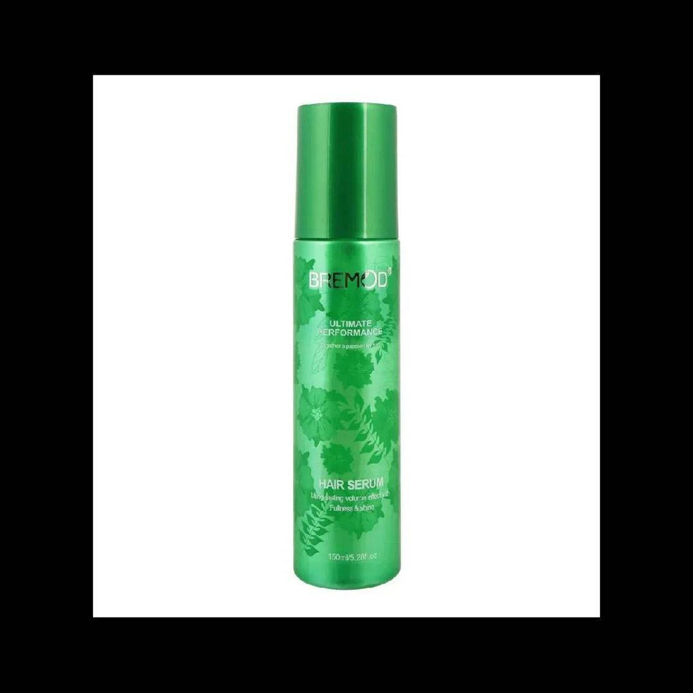 Green hair serum bottle with BREMOD branding and silver cap