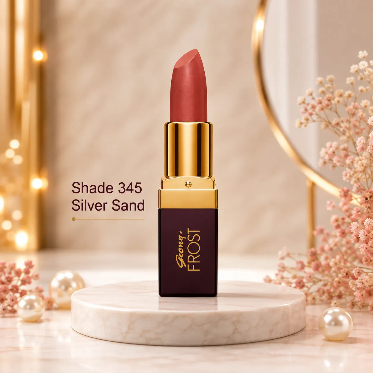 Gold-capped lipstick Shade 345 Silver Sand with red bullet, Frost tube shown upright.