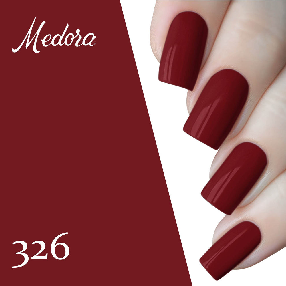 Burgundy nail polish on fingernails, four glossy burgundy-red nails