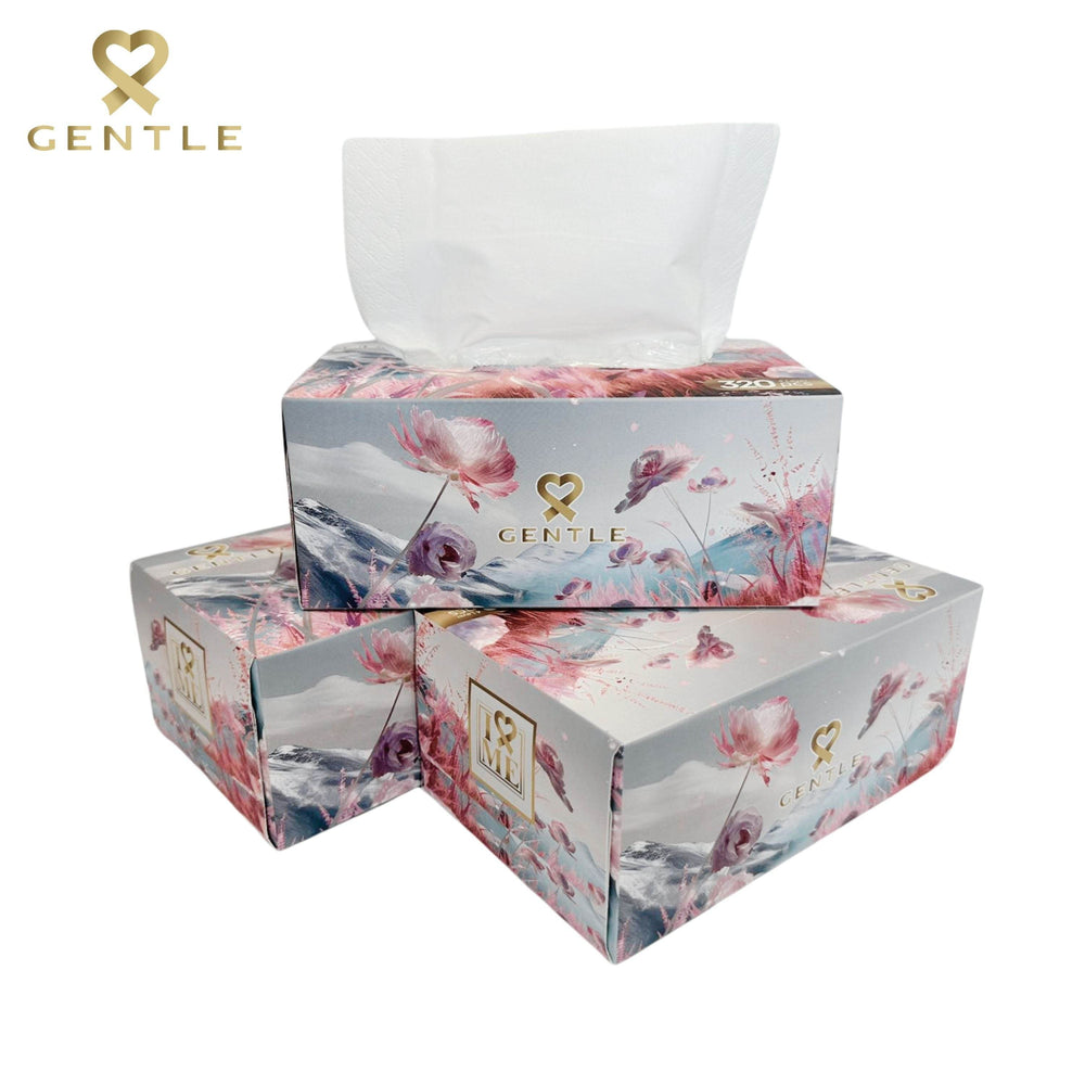 Multi-pack tissue boxes with floral print and white tissues peeking out