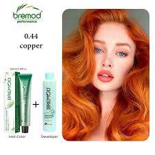 Hair dye box and tube with model showing 0.44 copper hair color