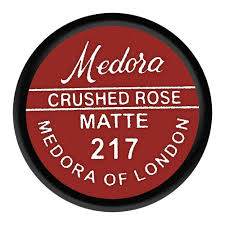 Medora crushed rose matte lipstick label, dark round cap with 217
